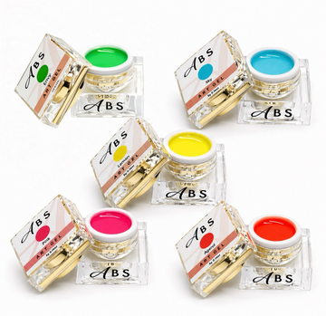 Set of ABS art gel jars with colorful pots of gel on a white background